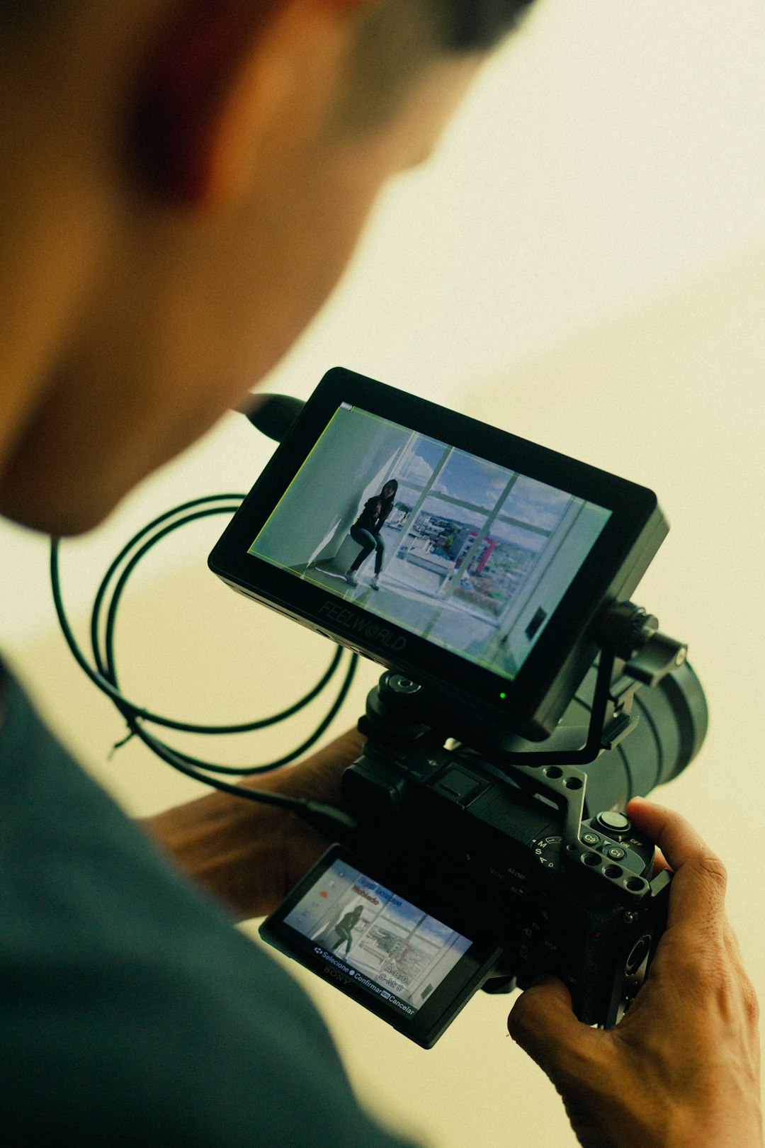 a-man-holding-a-camera-and-recording-a-video-5o0vn9pdwuy